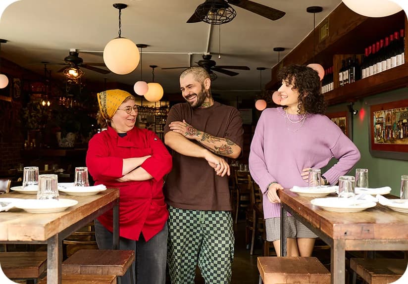 Three members of a restaurant team standing together