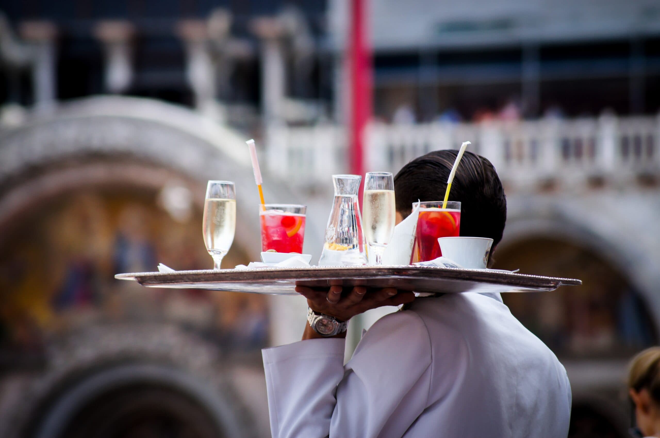 Insert image of restaurant servers busy at work